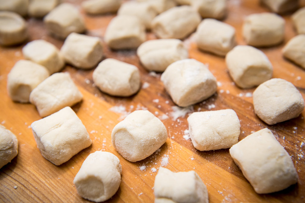 Unbaked pretzel bites on cutting board