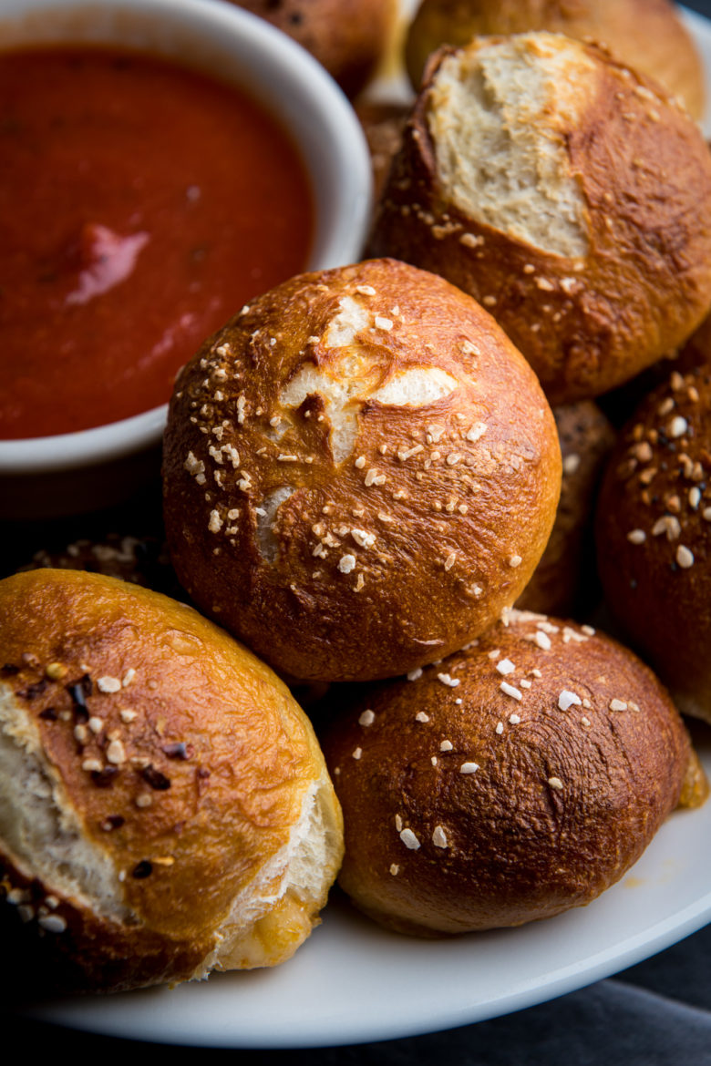 vegan stuffed soft pretzel bites with marinara sauce