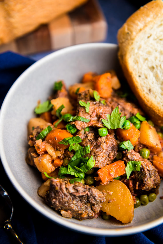 Bowl of Easy Slow Cooker Beef Stew with Rosemary Bread