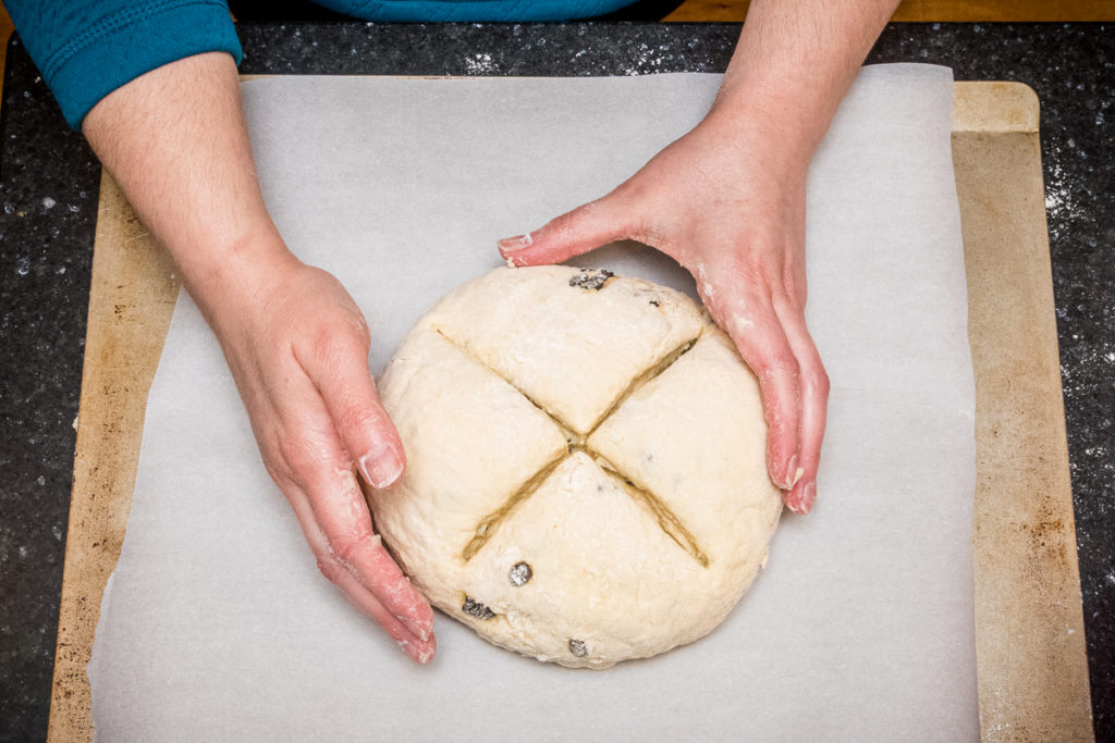 Cut a cross in the top of your soda bread to help it rise properly.
